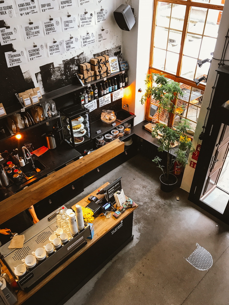 table, room, shop, industry, architecture, absence, commerce, high angle view, window, plant, bar counter, service, interior design, retail, still life