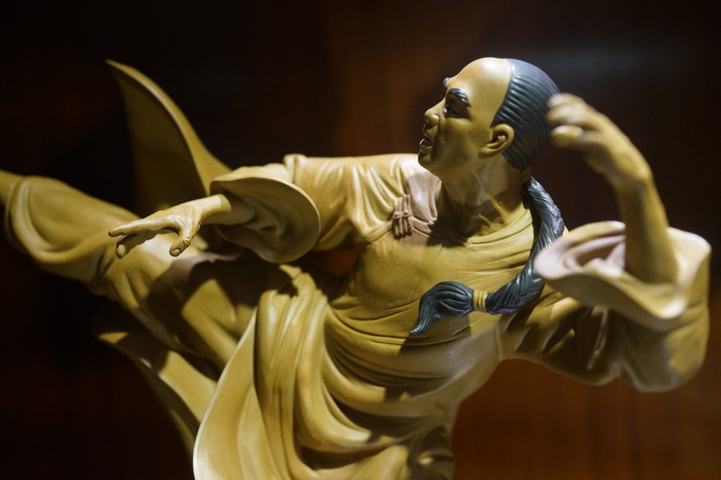 close-up, history, human representation, kung-fu fighter kung-fu kick, the past, statue, male likeness, 5K, wushu, representation, indoors, chinese martial arts