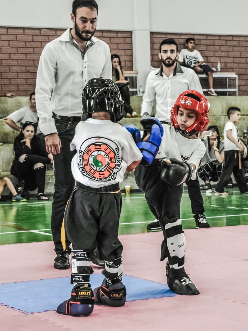 lifestyles, full length, junior, front view, casual clothing, 4K, looking at camera, Fight, human body part, Competition, costume, holding, day, young men