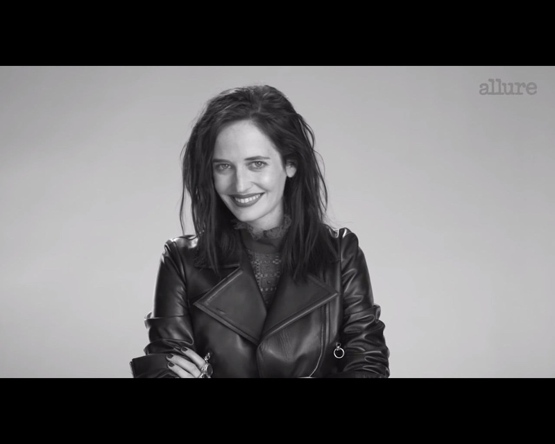 indoors, real people, Eva Green, monochrome, adult, standing, smiling, one person, happiness, beautiful woman, portrait, young adult, women, waist up, emotion