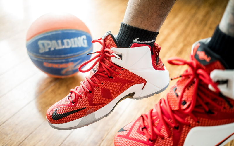 sport, day, shoes, real people, shoelace, wall, lebron, close-up, human body part, focus on foreground, human limb, body part, indoors, sock, themed, human leg