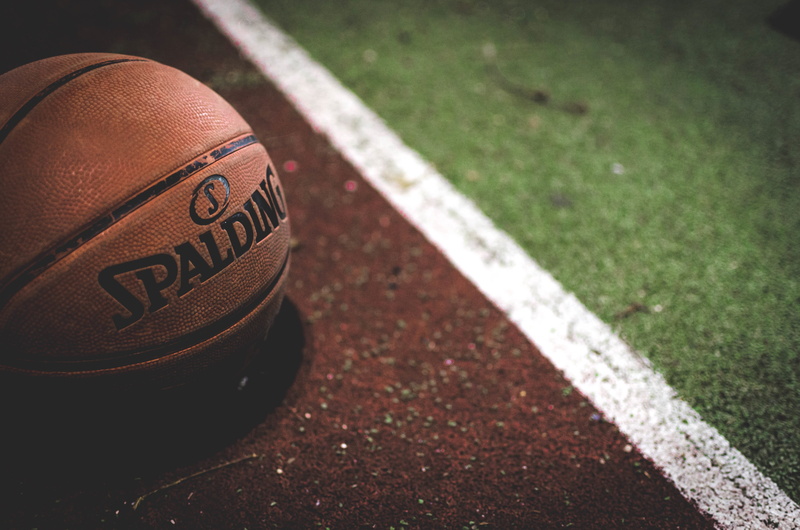 floor, number, close-up, jogging, red, sign, team sport, outdoors, run, sport, focus on foreground, communication, day, high angle view, text, american football - ball