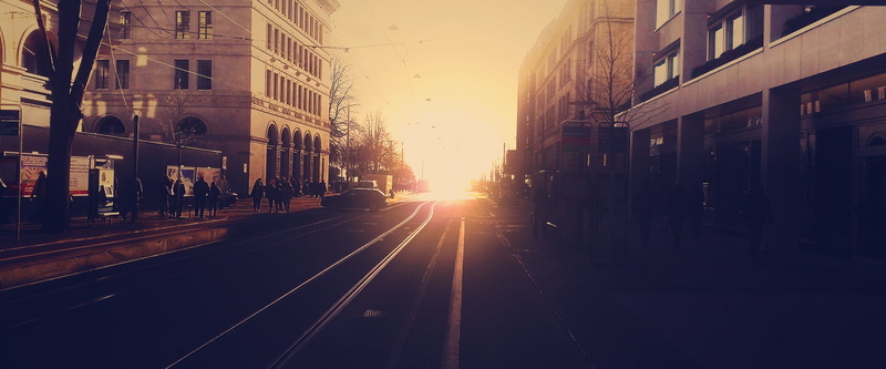 street, 1080P, sunrise, road, outdoors, car, building exterior, sunset, railroad track, track, architecture, sunbeam, cityscape, built structure, sun