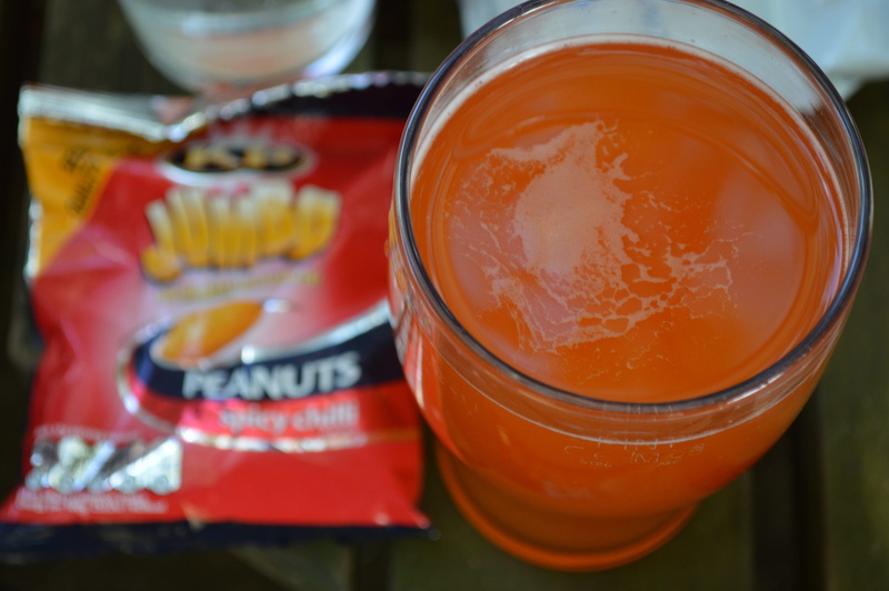 food, focus on foreground, orange, food and drink, wellbeing, orange color, refreshment, drink, healthy eating, peanuts, cider, household equipment, glass