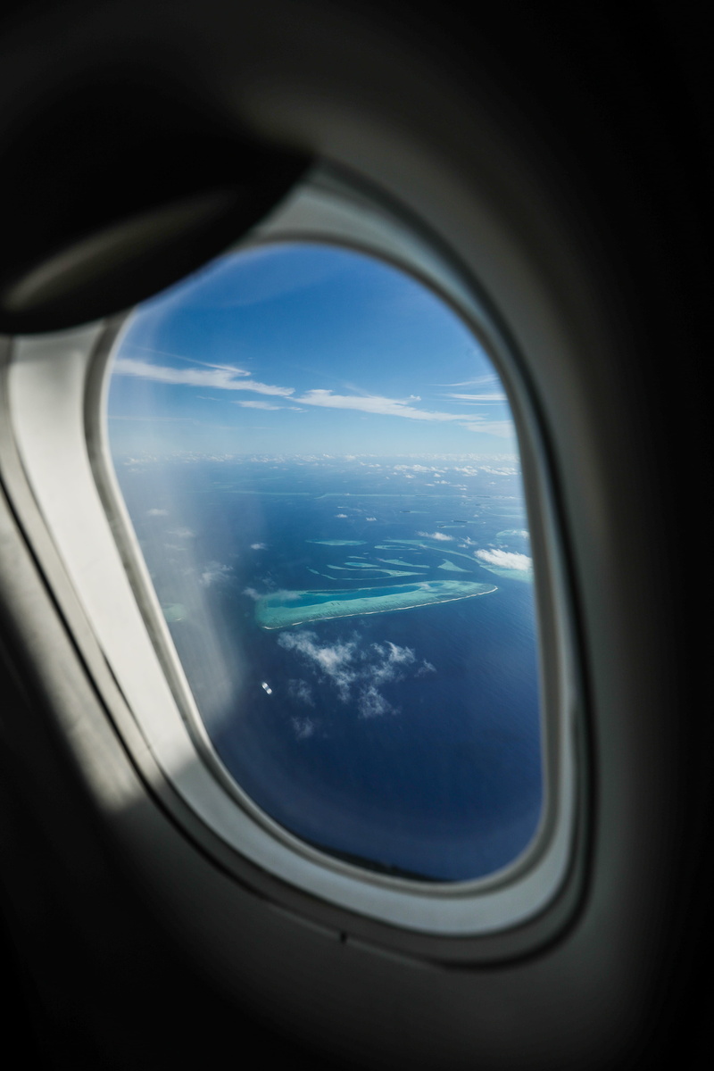 plane, outdoors, transparent, no people, window seat, shot, flying, aerial, air vehicle, island, window, day, travel, cloud - sky, vehicle interior, motion