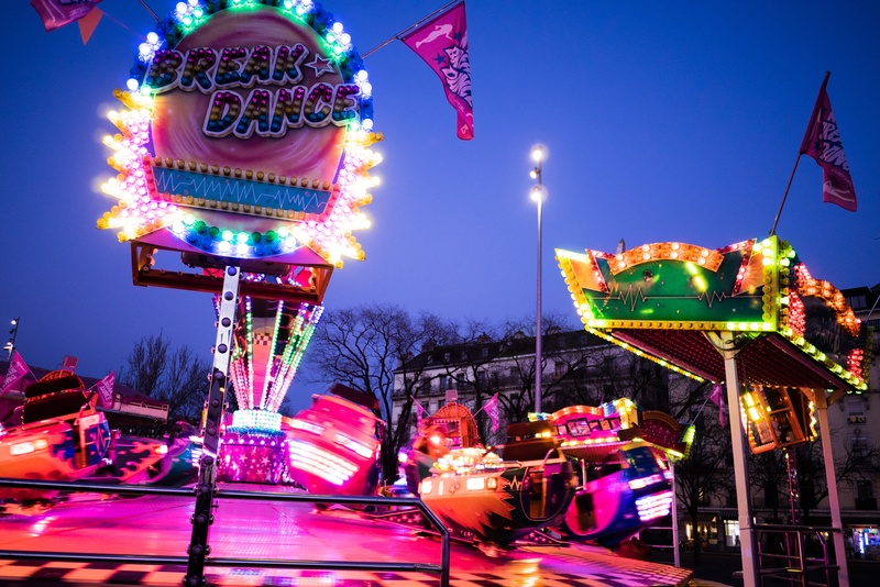carousel, signage, real people, led, architecture, amusement park ride, sky, amusement park, light, break, blurred motion, nature, outdoors, fair, evening