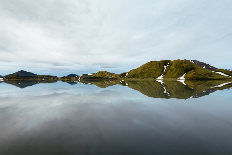 island, beauty in nature, close-up, standing water, sky, clam, non-urban scene, scenics - nature, lake, no people, reflection, blue, tranquil scene, green