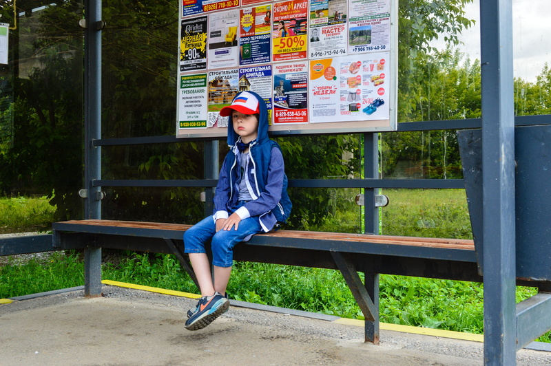 males, innocence, real people, cap, moscow region, teenager, leisure activity, seat, boy, motion, looking at camera, lifestyles, teenage boys, full length