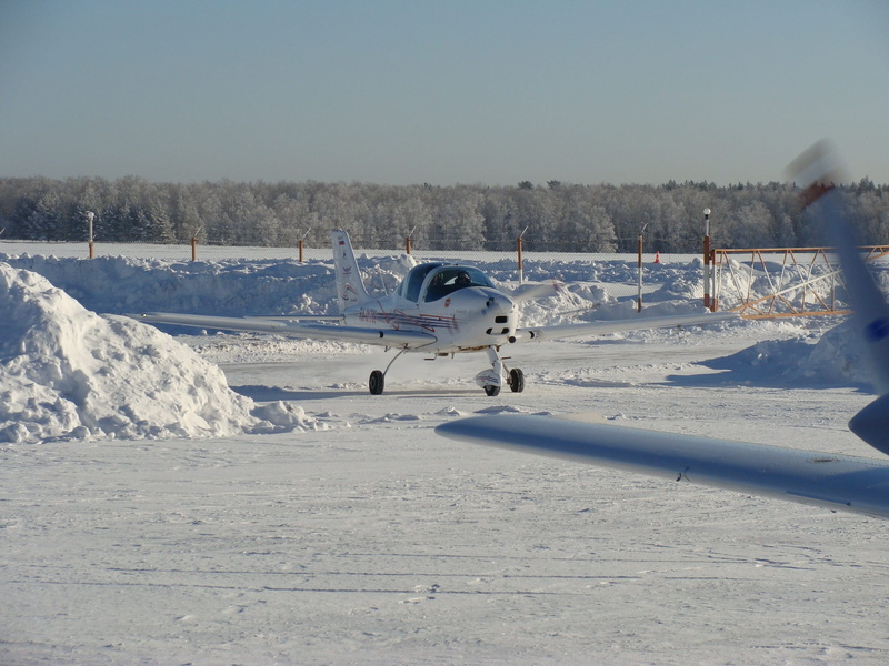 white color, take off, transportation, sunlight, cold temperature, flying, Winter, sky, sport, field, frozen, mountain, day, Moscow Region, covering, Aircraft