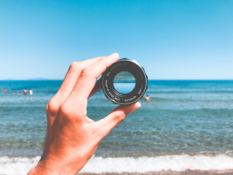 sky, finger, body part, pictures, beach, horizon over water, nature, outdoors, personal perspective, italy, human hand, hand, case, horizon, sea, black