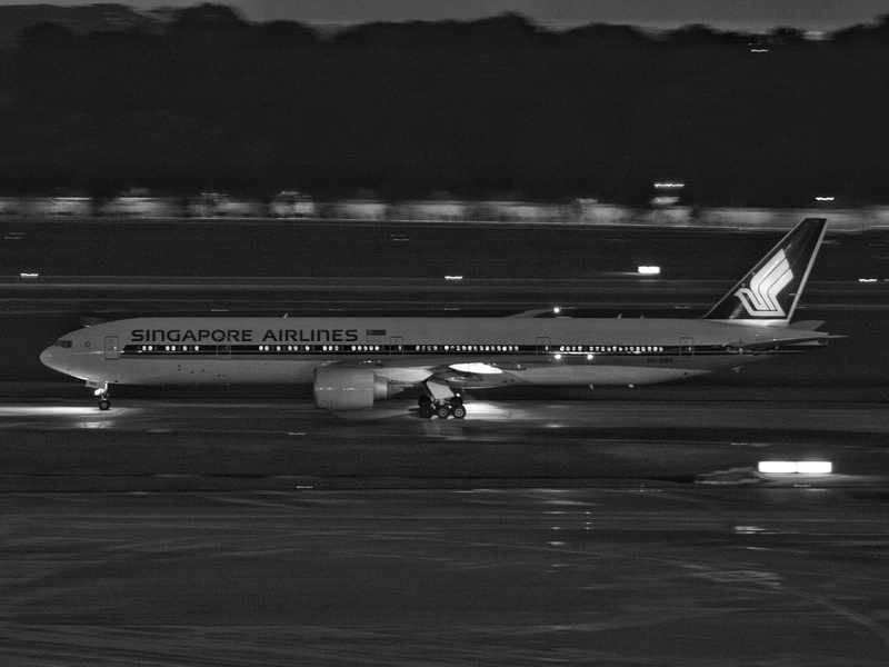 changi airport singapore, singapore, text, outdoors, motion, road, transportation, airport runway, on the move, mode of transportation, travel, car, sign