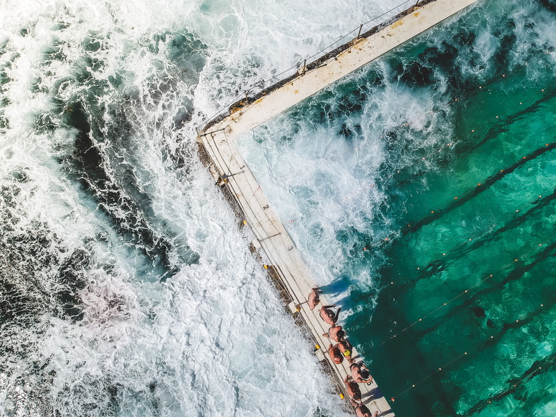 power in nature, swimming pool, bondi beach in sydney, outdoors, aquatic sport, swimming, nature, 4K, aerial, view, bird eyes view, high angle view, water