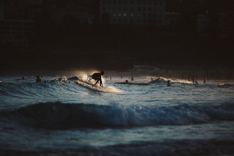 light, beach, people, nautical vessel, sunset, travel, ocean, bondi, sport, reflection, surfing, mode of transportation, transportation, wafe, night, wave