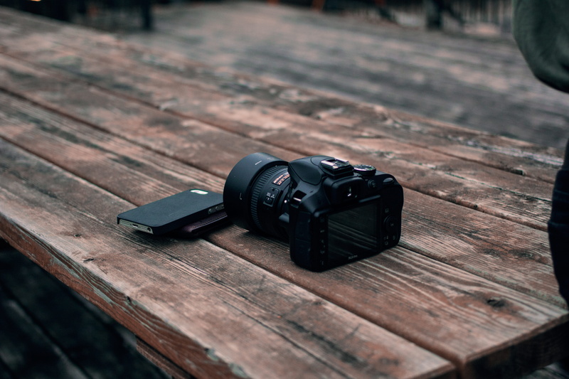 focus on foreground, photographing, table, still life, photography themes, high angle view, technology, black, brown, foto, dlsr camera, day, phone, canada