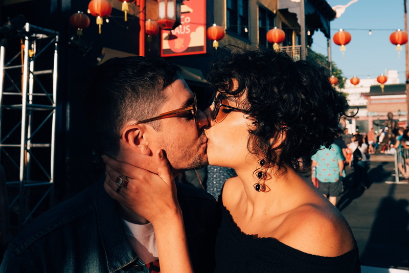 kiss, lighting, hairstyle, portrait, crowd, love, face, 2K, los angeles, urban, men, night, man, black, clothing, two people, women, chinatown, tripod