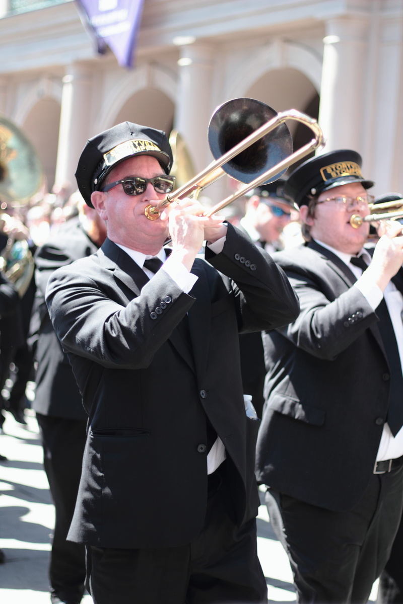second line, adult, funeral, parade, new orleans, young men, people, incidental people, mid adult men, black, trombone, males, 5K, focus on foreground