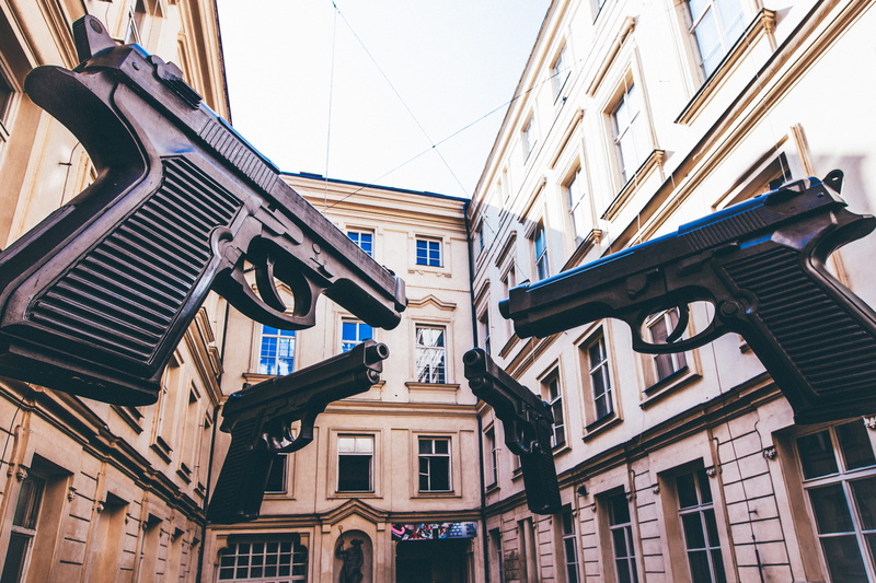 czech republic, cable, sunlight, magnum, no people, building exterior, art, window, exhibition, artist, low angle view, weapon, residential district, sky