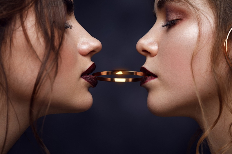 black background, two people, 1080P, indoors, human lips, portrait, women, body part, profile view, young adult, side view, emotion, falling in love, females