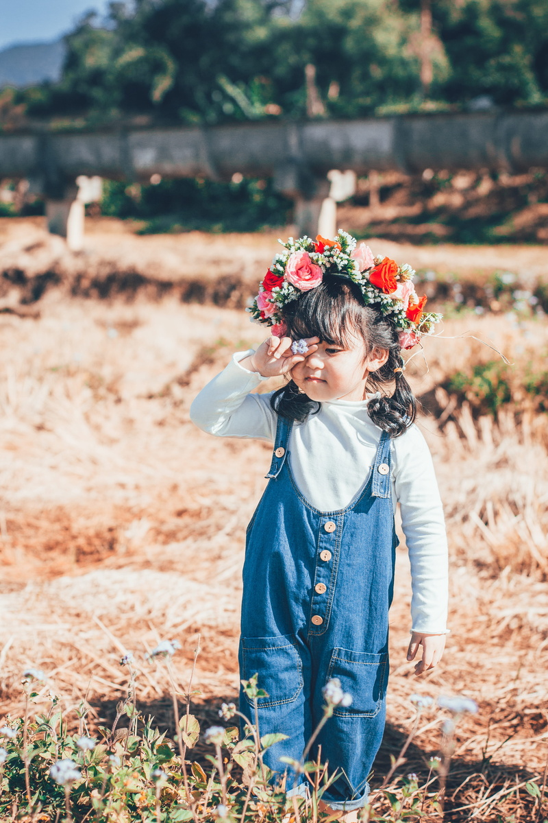 plant, innocence, land, girls, crown, wearing flowers, real people, nature, girl, grass, kid, flower, flowering plant, outdoors, casual clothing, females