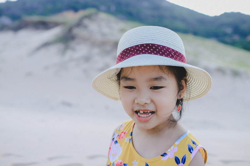 precious moment, happiness, vacation, leisure, front view, one person, kid, summer, beach hat, child, sun hat, outdoors, smile, land, cute, emotion, innocence