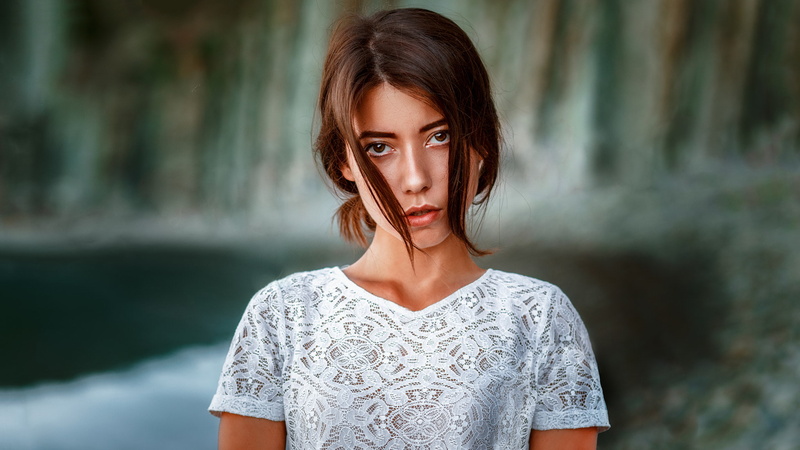 outdoors, Andrey Metelkov, young women, depth of field, headshot, hair, looking at camera, young adult, focus on foreground, one person, 1080P, contemplation