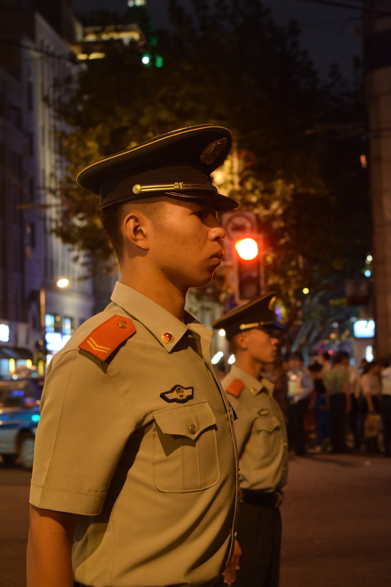 men, looking, illuminated, architecture, strict, law, night, one man only, police force, government, one person, looking away, focus on foreground, uniform