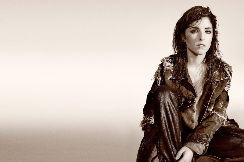 studio shot, fashion, Actress, clothing, hairstyle, 2K, long hair, hair, looking at camera, Singer, women, adult, beautiful woman, leather, jacket, copy space