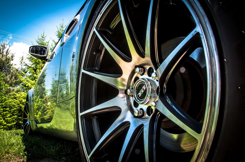 transportation, car wheel, car, nature, silver colored, land vehicle, tire, no people, chrome wheel, outdoors, metal, wheel, day, mode of transportation