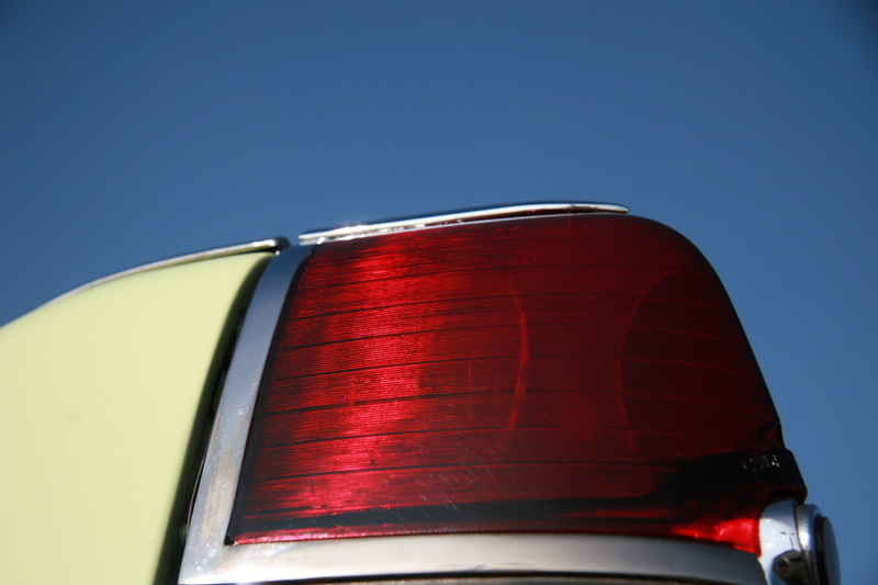 colored background, motor vehicle, nature, 2K, tail, car, red, outdoors, close-up, vintage, retro, automobile, land vehicle, abstract, tail light, clear sky