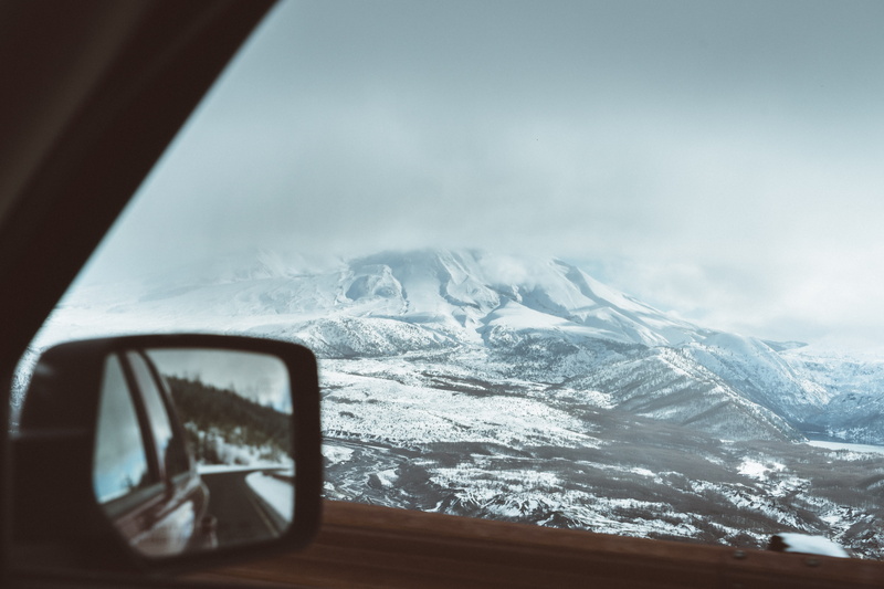 mirror, rear-View Mirror, vehicle interior, land Vehicle, day, window, mode of transportation, environment, wing, road trip, windshield, mountain range