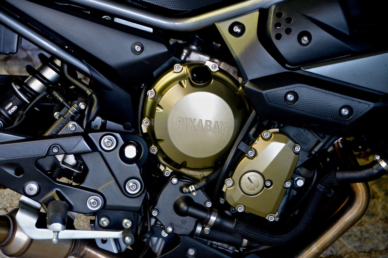 motor, outdoors, metal, construction, no people, close-up, black color, car, image retouching, engine, art of engineering, transportation, inscription