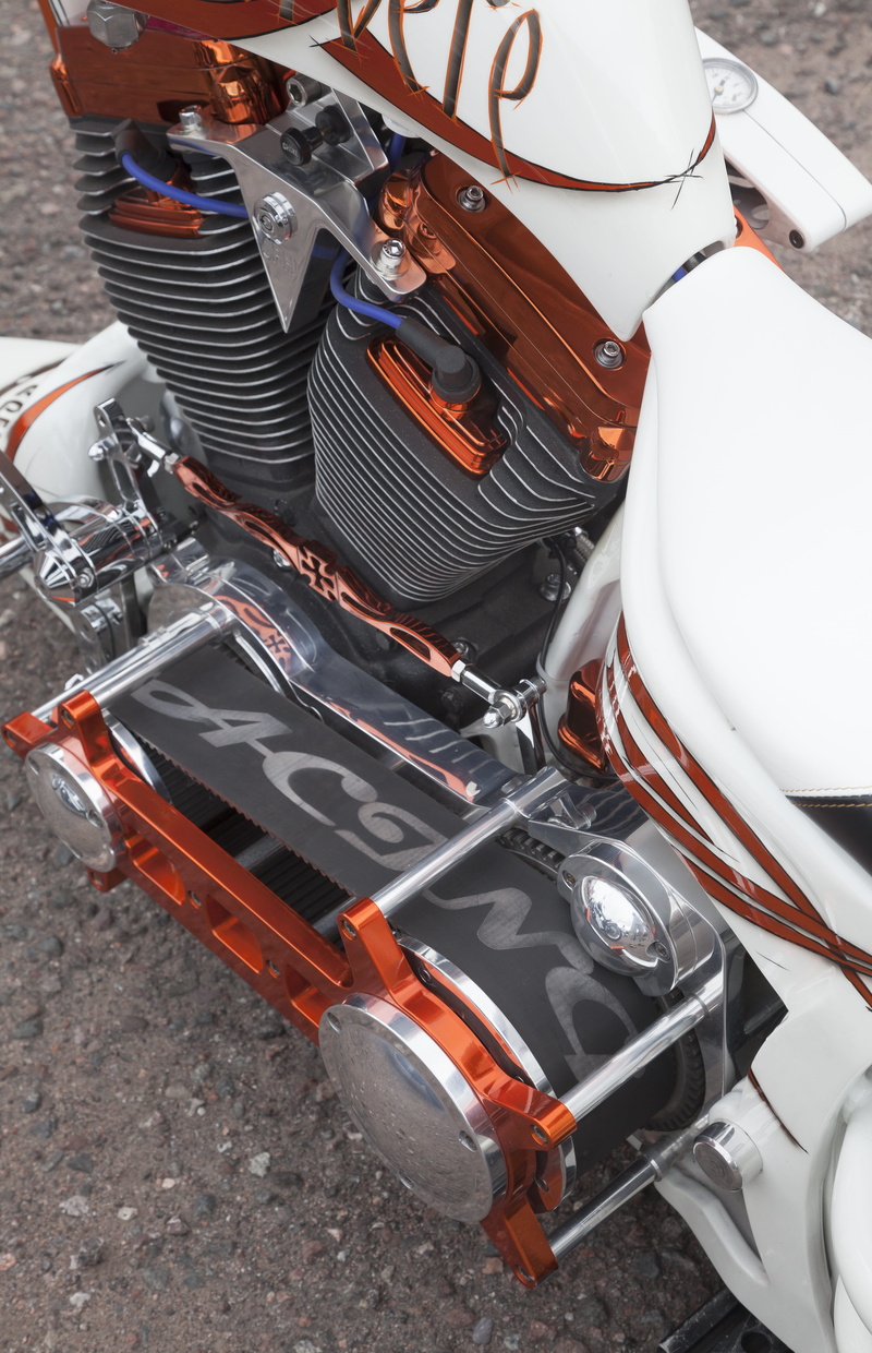 motorcycle, outdoors, mechanic, Bike, land vehicle, constructed in it, no people, machine part, orange, technology, Engine, nature, clean, high angle view