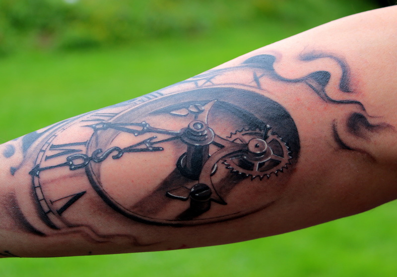 clock, adult, showing, skin, forearm, leisure activity, men, symbol, close-up, tattoo, glasses, day, creativity, profile view, roman numbers, real people