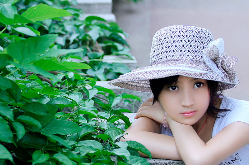 beautiful woman, retouching, headshot, looking at camera, innocence, real people, day, looking, hairstyle, one person, contemplation, women, leaf, portrait