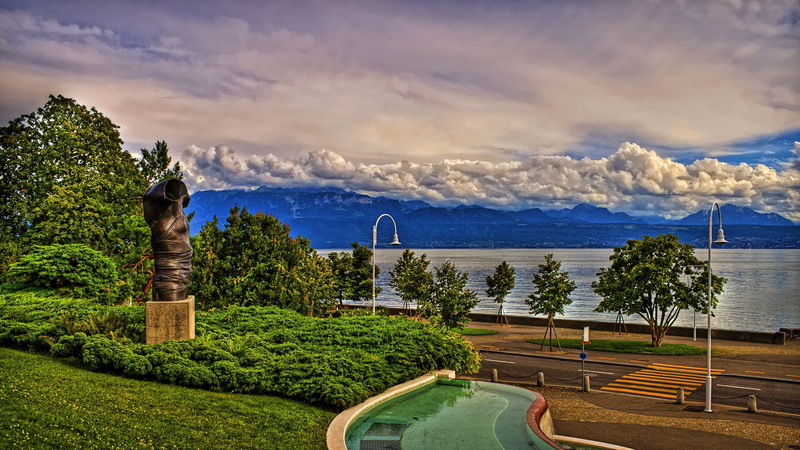 water, building exterior, trees sea clouds mountains retouching cityscape, beauty in nature, looking at view, tree, architecture, tranquility, no people