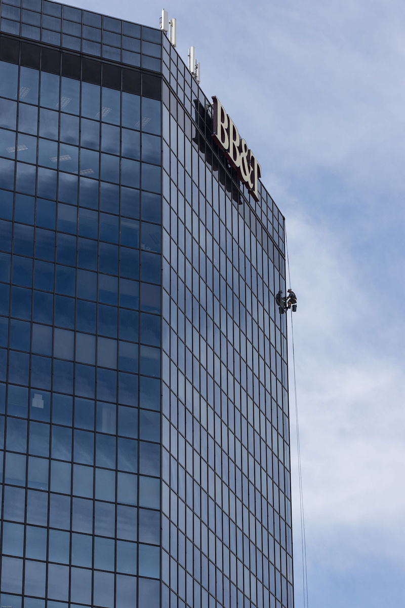 glass - material, workplace, no people, low angle view, nature, building exterior, modern, office building exterior, city, outdoors, tall - high, built structure
