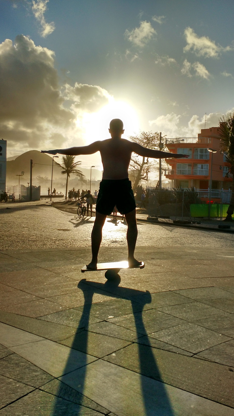 skill, city, sky, arms raised, bright, full length, rio de janeiro, plank balance, lens flare, one man only, against light, Plank, Balance Board, cloud - sky