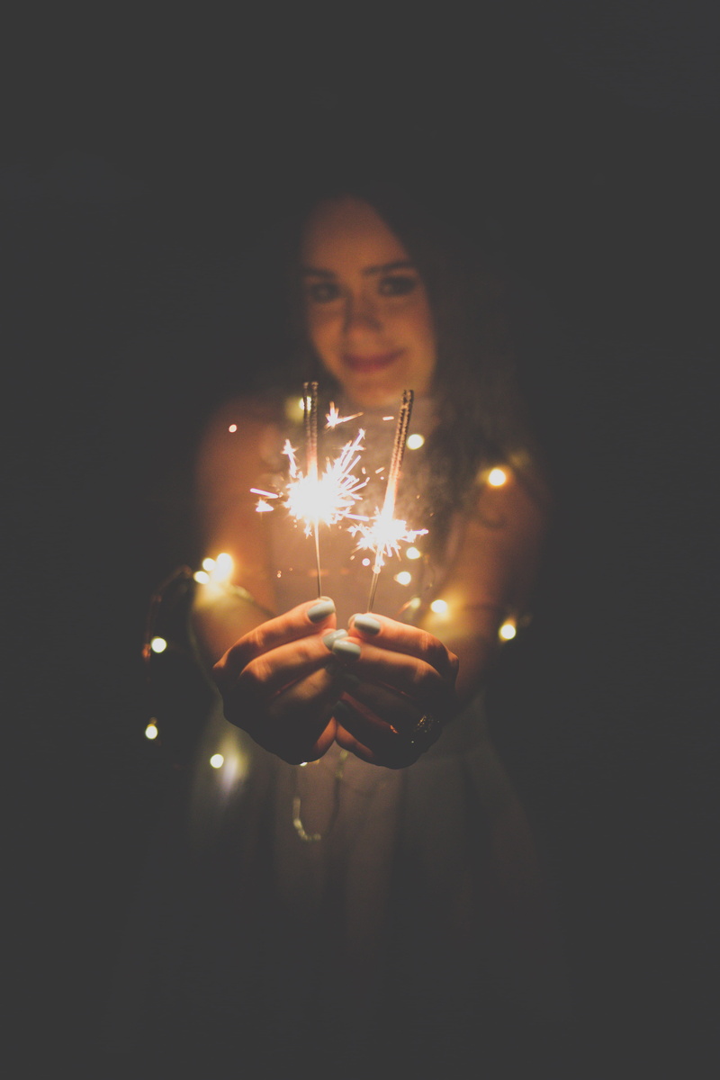 one person, adult, sparkler, portrait, lifestyles, young adult, real people, wearing, 4K, studio shot, sticks, light, indoors, black, lighting equipment