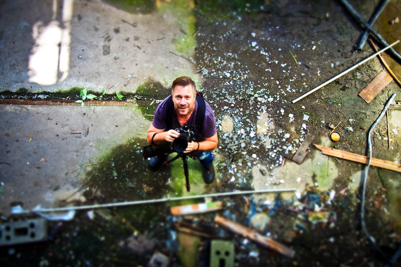 real people, photograph, old factory hall, selective focus, day, casual clothing, mid adult men, mid adult, water, pollution, leisure activity, from above