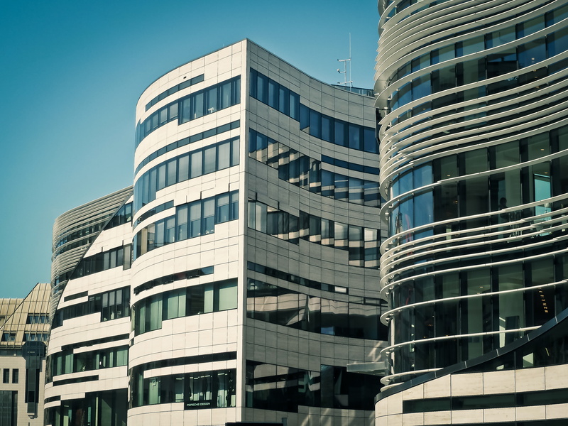 office building exterior, glass, glass - material, window, nature, office, kö bow, building exterior, outdoors, blue, day, built structure, modern, clear sky