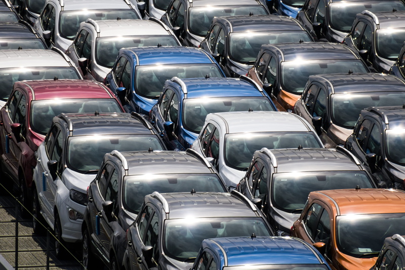 no people, full frame, mode of transportation, abundance, high angle view, large group of objects, silver colored, new cars, motor vehicle, transportation