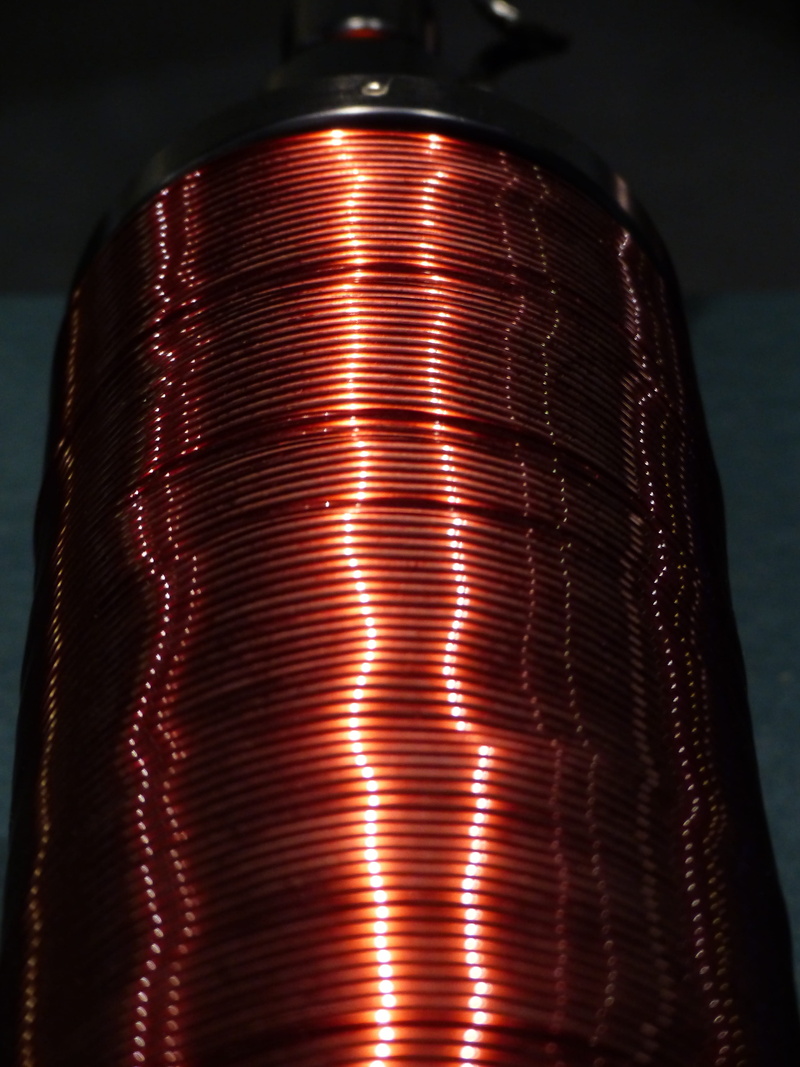 pattern, red, lighting equipment, no people, physics, technology, close-up, rolled, electrical engineering, spiral, light - natural phenomenon, business