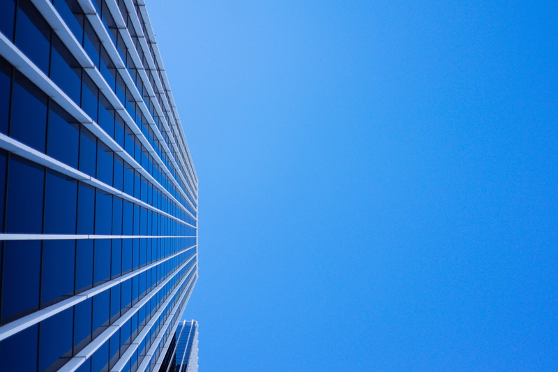clear sky, low angle view, sunny, glass - material, blue, business, building exterior, corporate, modern, city, no people, sunshine, outdoors, 4K, office