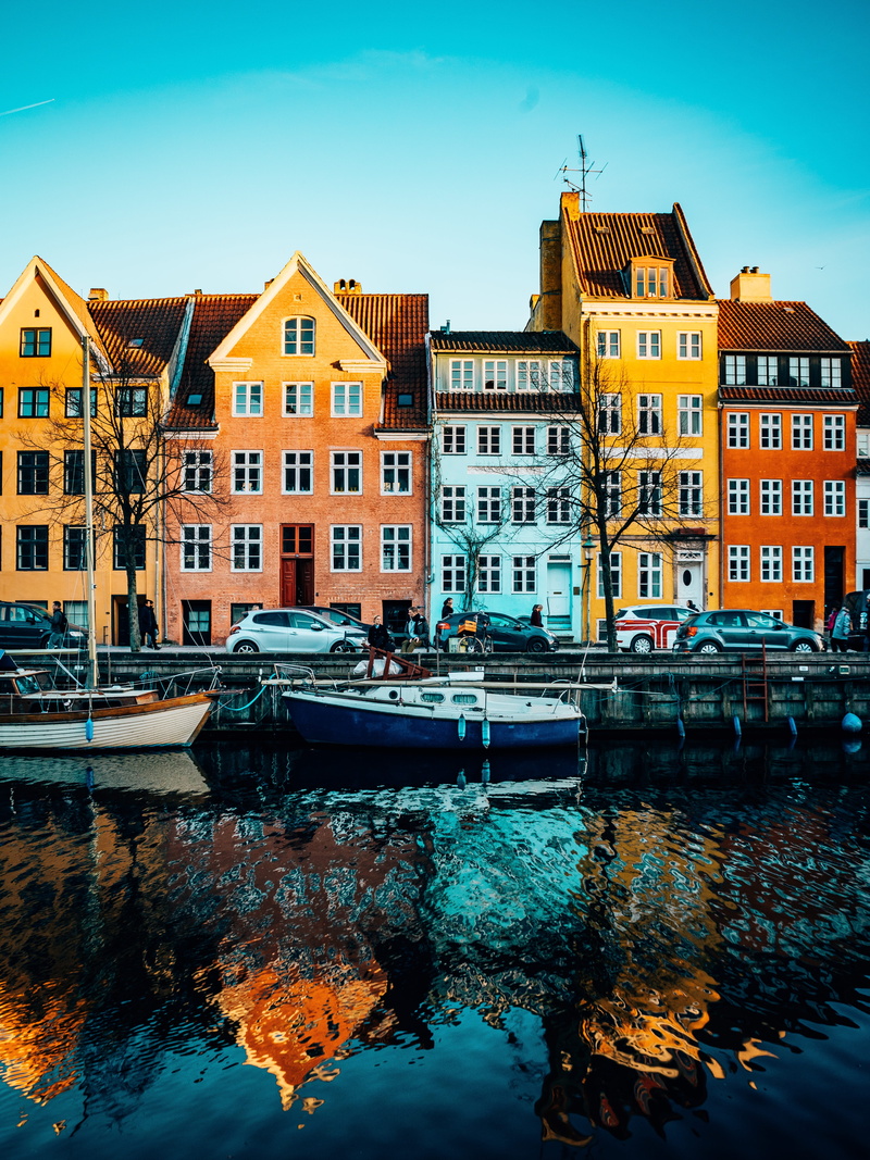 houses, city, travel, outdoors, architecture, europe, built structure, boats, sailboat, waterfront, water, row house, copenhagen, colourful, day, nautical vessel