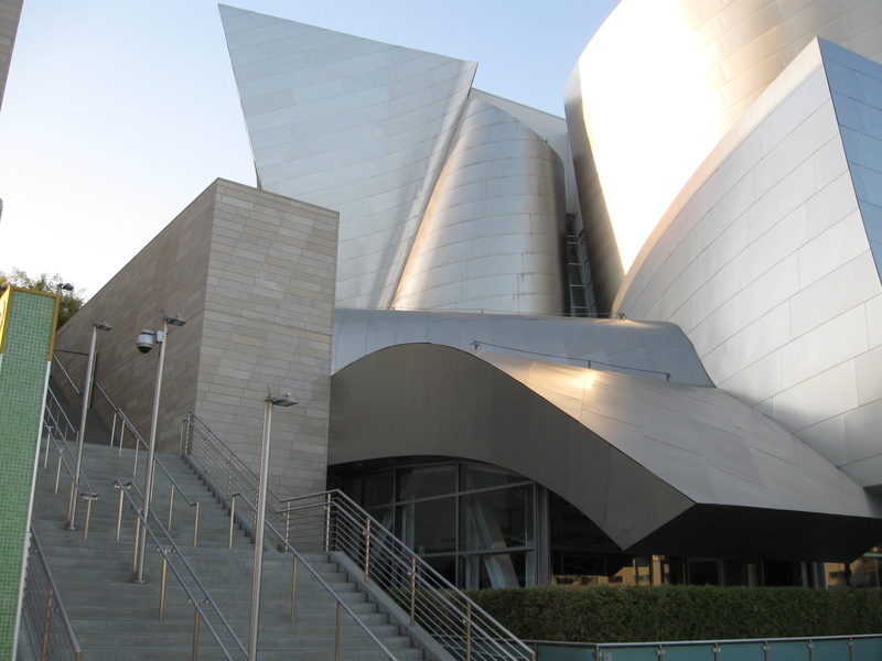 travel destinations, low angle view, industry, sky, nature, skyscraper, concert hall, day, outdoors, walt disney, cinema hall, sunlight, studio, architecture