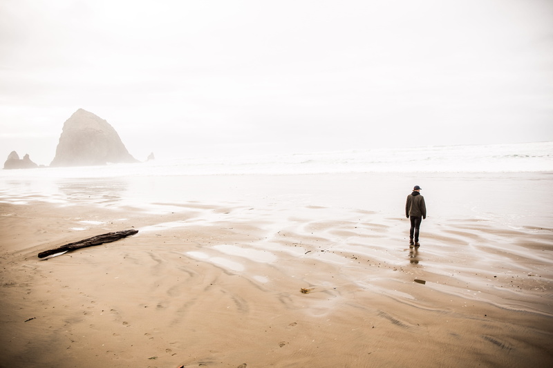 rock - object, day, sky, one person, shoreline, person, standing, beach, man, land, rear view, rock, nature, sand, 5K, water, holiday, outdoors, sea, thirds