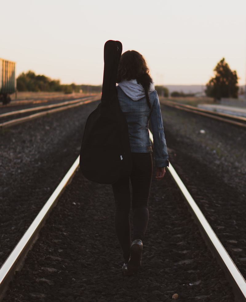 train station, nature, locomotive, lifestyles, sunset, one person, transportation, guidance, full length, rail, the way forward, guitar, real people, adult