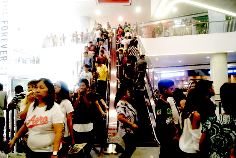 philippines, lifestyles, crowd, illuminated, motion, group of people, standing, real people, 4K, architecture, women, mindanao, shopping mall, store, indoors