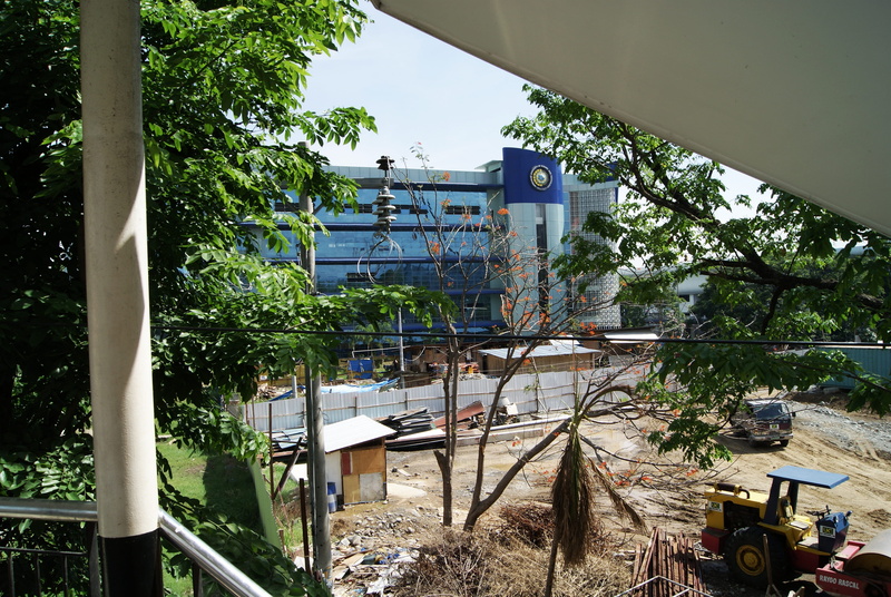 land vehicle, machinery, plant, day, transportation, building exterior, construction site, bulldozer, no people, mindanao, building, residential district