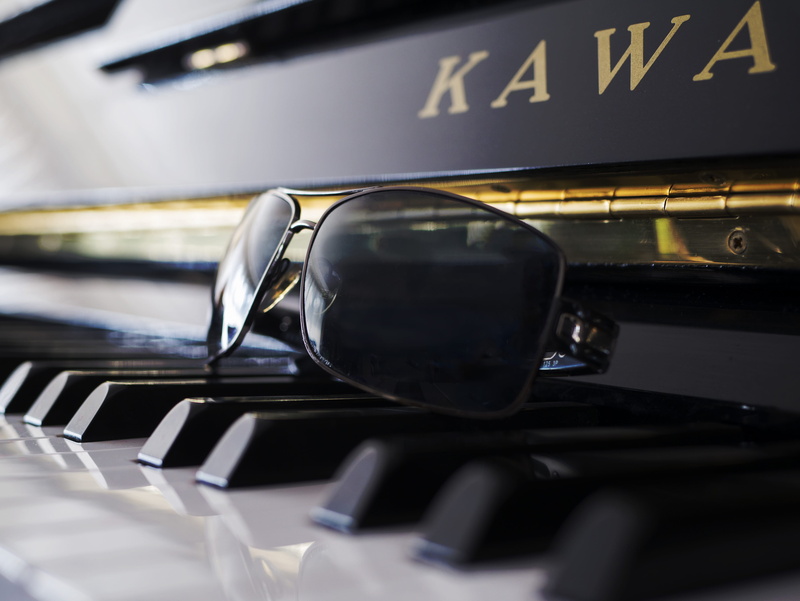 black color, mode of transportation, overexposed, personal accessory, piano key, car, 4K, light, land vehicle, closeup, reflection, no people, musical instrument